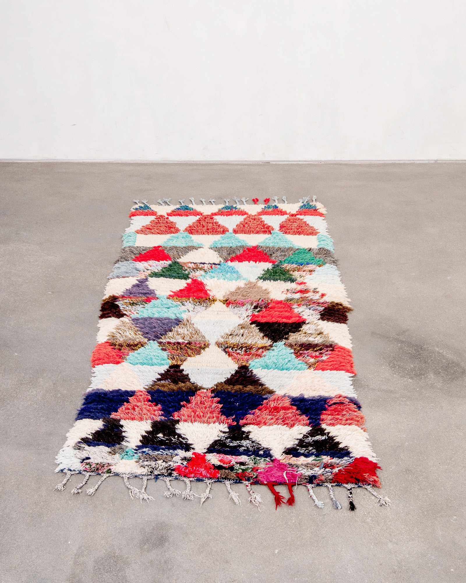 Modern, designer, handcrafted Berber rug from Morocco. Vintage carpet with beautiful colours and patterns and fluffy wool texture.